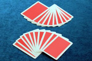 Two ten-card hands of playing cards